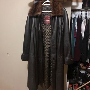 Leather trench coat with fur collar